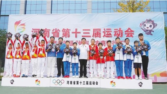 周口市网球队团体赛收获两金